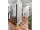 Hallway showcasing hardwood floors and modern fixtures, creating a welcoming atmosphere to the interior spaces at 1195 Village Creek Ln # 2, Mount Pleasant, SC 29464
