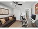 Bright home office with hardwood floors, closet, and a large desk area at 1195 Village Creek Ln # 2, Mount Pleasant, SC 29464