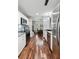 Well-lit kitchen with stainless steel appliances, white cabinetry, and an open view to dining area at 1195 Village Creek Ln # 2, Mount Pleasant, SC 29464