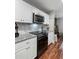 Bright kitchen showcasing modern appliances, granite countertops and white marble backsplash at 1195 Village Creek Ln # 2, Mount Pleasant, SC 29464