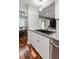 Well-designed kitchen with granite countertops and a modern faucet at 1195 Village Creek Ln # 2, Mount Pleasant, SC 29464