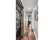 A modern laundry area featuring a stackable washer and dryer, conveniently located in the hallway at 1195 Village Creek Ln # 2, Mount Pleasant, SC 29464