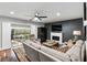 Comfortable living room with modern fireplace and outdoor access, perfect for relaxing and entertaining in style at 1195 Village Creek Ln # 2, Mount Pleasant, SC 29464