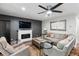 Stylish living room with fireplace, contemporary decor, and a spacious layout, ideal for modern living and entertaining at 1195 Village Creek Ln # 2, Mount Pleasant, SC 29464