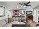 Open concept living room featuring hardwood floors, comfortable seating, and modern ceiling fan at 1195 Village Creek Ln # 2, Mount Pleasant, SC 29464