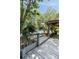 Inviting pool area with shaded deck and view of the surrounding lush landscaping at 1195 Village Creek Ln # 2, Mount Pleasant, SC 29464