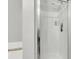 Shower in bathroom with glass door and white tiles, ensuring cleanliness and natural light at 125 Towering Pine Dr, Ladson, SC 29456