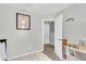 Bright bedroom featuring a door leading to the hallway and carpet flooring at 125 Towering Pine Dr, Ladson, SC 29456
