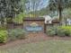 Picturesque brick community entrance sign for Summerhaven, surrounded by lush landscaping and mature trees at 125 Towering Pine Dr, Ladson, SC 29456