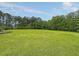 Expansive lush green space offers great views, recreational opportunities, and enhances the natural beauty at 125 Towering Pine Dr, Ladson, SC 29456