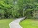 Nature path leading to bridge through a forest at 125 Towering Pine Dr, Ladson, SC 29456