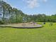 Well-equipped community playground features various play structures and ample space for children to enjoy at 125 Towering Pine Dr, Ladson, SC 29456