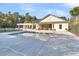 The pristine community pool and clubhouse are perfect for relaxation and social gatherings at 125 Towering Pine Dr, Ladson, SC 29456