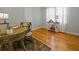 Bright office with a desk and chair, a neutral rug, and hardwood floors at 1298 French Santee Rd, Jamestown, SC 29453