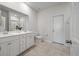 Clean, bright bathroom featuring double sinks, a large mirror, and modern fixtures for a fresh feel at 143 Daniels Creek Cir, Goose Creek, SC 29445
