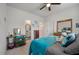 Cozy bedroom featuring soft carpet, turquoise comforter, and furniture at 143 Daniels Creek Cir, Goose Creek, SC 29445