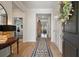 Inviting entryway with hardwood floors and views into the living spaces at 143 Daniels Creek Cir, Goose Creek, SC 29445