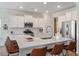 Bright kitchen with a spacious island, stainless appliances, and sleek cabinets at 143 Daniels Creek Cir, Goose Creek, SC 29445