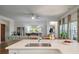 Bright, open kitchen featuring a large island overlooking the living area at 143 Daniels Creek Cir, Goose Creek, SC 29445