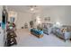 Inviting living room featuring comfortable seating, natural light, and stylish decor for a cozy atmosphere at 143 Daniels Creek Cir, Goose Creek, SC 29445