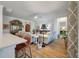 Comfortable living room featuring hardwood floors, ceiling fan, and stylish furniture at 143 Daniels Creek Cir, Goose Creek, SC 29445