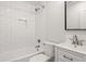 Clean bathroom featuring white subway tile in shower and modern vanity with sleek fixtures at 1430 E Montague Ave, North Charleston, SC 29405
