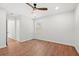 Spacious bedroom featuring hardwood floors, a ceiling fan, and a window at 1430 E Montague Ave, North Charleston, SC 29405