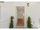Inviting entryway with a beautifully stained wood floor and a view to a bright, neutral interior at 1430 E Montague Ave, North Charleston, SC 29405