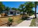 Charming home with a wood fence and sidewalk at 1430 E Montague Ave, North Charleston, SC 29405