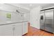 Kitchen with granite countertops, white cabinets, stainless steel appliances, and an open layout to living space at 1430 E Montague Ave, North Charleston, SC 29405