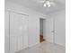 Bedroom with neutral carpet, ceiling fan and access to closet and the rest of the home at 1593 Westwood Dr, Charleston, SC 29412