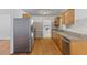 Functional kitchen with stainless steel appliances, light wood cabinets and granite countertops at 1593 Westwood Dr, Charleston, SC 29412