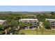 Aerial view of an end-unit townhouse with scenic views and lush surrounding trees at 1634 Live Oak Park, Seabrook Island, SC 29455