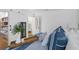 Bright bedroom with white shiplap walls, wood floors, and stylish nautical decorations at 1634 Live Oak Park, Seabrook Island, SC 29455