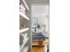 Beautiful bedroom featuring a nautical theme with white shiplap walls and wood floors at 1634 Live Oak Park, Seabrook Island, SC 29455