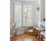 Cozy breakfast nook with window views, seating, and a pet-friendly area at 1634 Live Oak Park, Seabrook Island, SC 29455