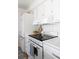 Charming kitchen featuring retro appliances and white cabinetry at 1634 Live Oak Park, Seabrook Island, SC 29455