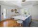 Bright, updated kitchen features modern appliances, a large island, and easy access to the dining area at 1634 Live Oak Park, Seabrook Island, SC 29455