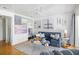 Comfortable living room features a blue sofa, nautical-themed decor, and unique built-in bunk beds at 1634 Live Oak Park, Seabrook Island, SC 29455