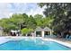Sparkling swimming pool with ample seating and a covered patio area at 1634 Live Oak Park, Seabrook Island, SC 29455