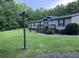 Exterior shot of a single story home with mature landscaping at 1671 Dawson Branch Rd, Summerville, SC 29483