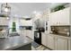 Bright kitchen showcasing updated cabinets and countertops, paired with stylish backsplash and modern fixtures at 1671 Dawson Branch Rd, Summerville, SC 29483