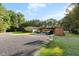 Wide view of a home on large lot with mature trees at 1671 Dawson Branch Rd, Summerville, SC 29483