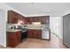Functional kitchen design with stainless steel appliances and dark wood cabinetry at 1703 Dotterers Run, Charleston, SC 29414