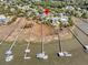 Aerial view featuring long docks extending out to the water, offering boating access from this waterfront community at 1720 Bowline Dr, Mount Pleasant, SC 29466