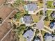 Aerial view shows lush landscaping, backyard pools and outdoor living spaces among upscale homes in the community at 1720 Bowline Dr, Mount Pleasant, SC 29466