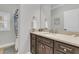 Bathroom with a vanity, sink, towel, and a shuttered window at 1720 Bowline Dr, Mount Pleasant, SC 29466