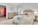Stylish bedroom showcasing a bed, dresser, and décor, creating a serene and inviting atmosphere at 1720 Bowline Dr, Mount Pleasant, SC 29466
