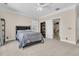 Cozy bedroom featuring neutral walls, carpet, and a glimpse into the closet space, promoting comfortable living at 1720 Bowline Dr, Mount Pleasant, SC 29466