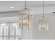 A close up of the glass and gold chandeliers at 1720 Bowline Dr, Mount Pleasant, SC 29466